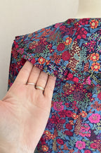 Vue de dos du col claudine blouse Juliette fleurie In April 1986