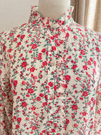 Détail finitions blouse Mila rouge vert In April 1986