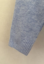 Pull femme bleu ciel coupe ample - détail manche